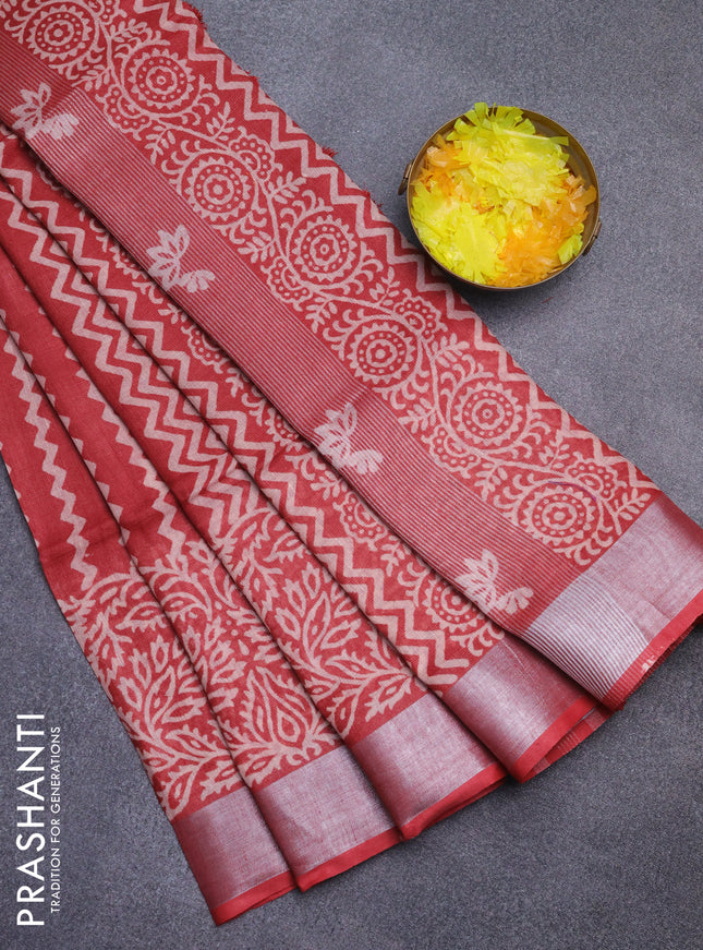Pure linen saree maroon shade with allover prints and silver zari woven border