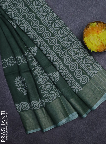 Pure linen saree green with butta prints and silver zari woven border