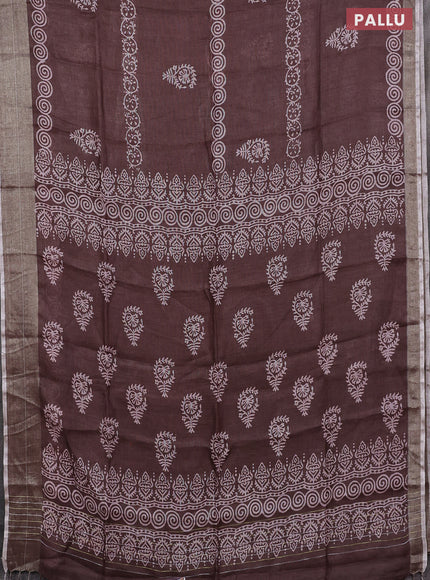 Pure linen saree brown with butta prints and silver zari woven border