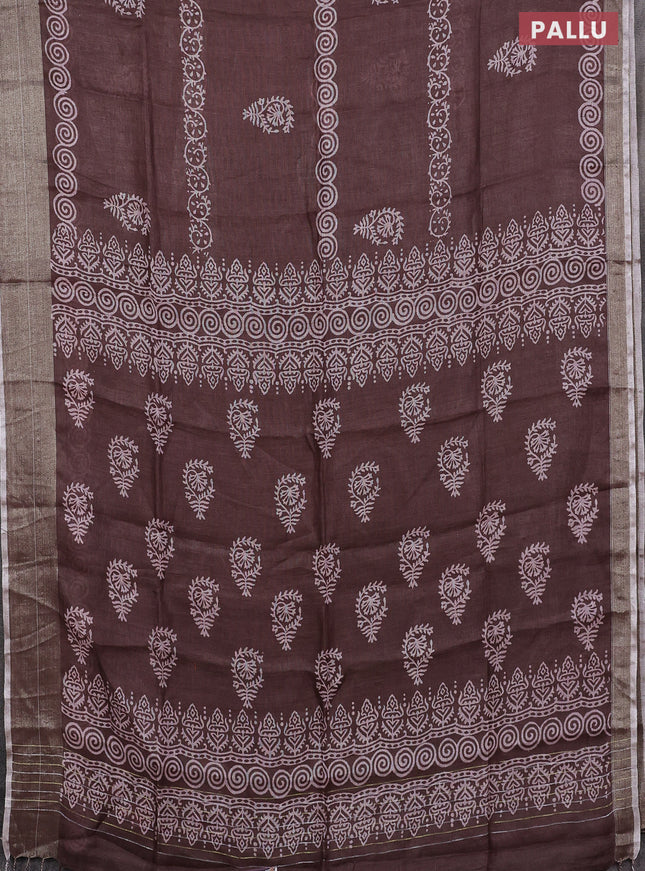 Pure linen saree brown with butta prints and silver zari woven border