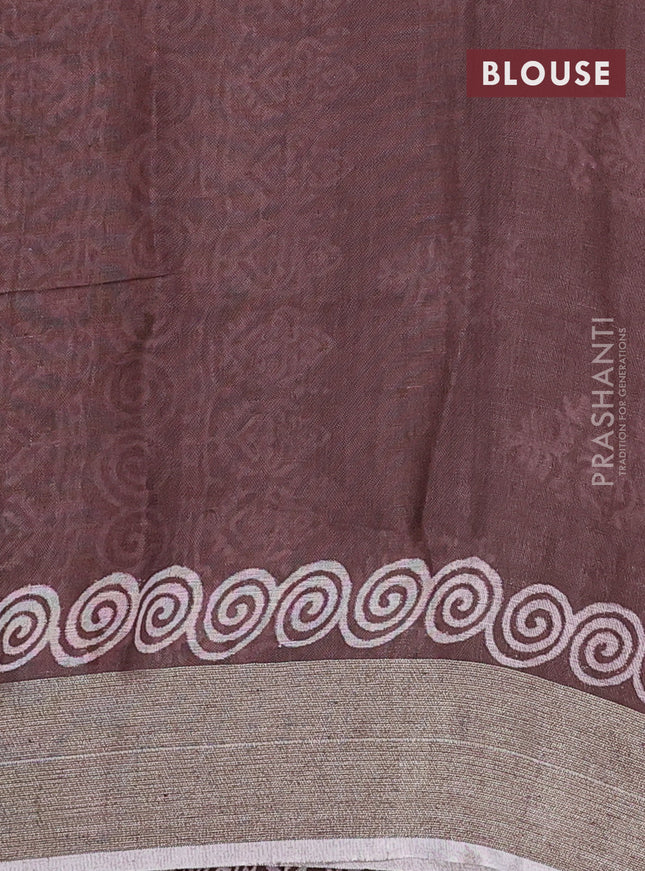 Pure linen saree brown with butta prints and silver zari woven border