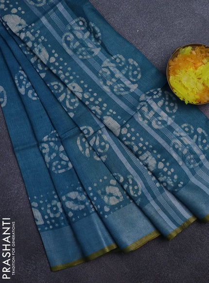 Pure linen saree teal blue with batik butta prints and silver zari woven border