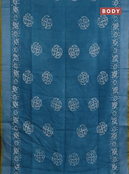 Pure linen saree teal blue with batik butta prints and silver zari woven border
