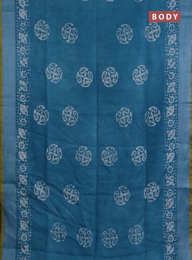 Pure linen saree teal blue with batik butta prints and silver zari woven border