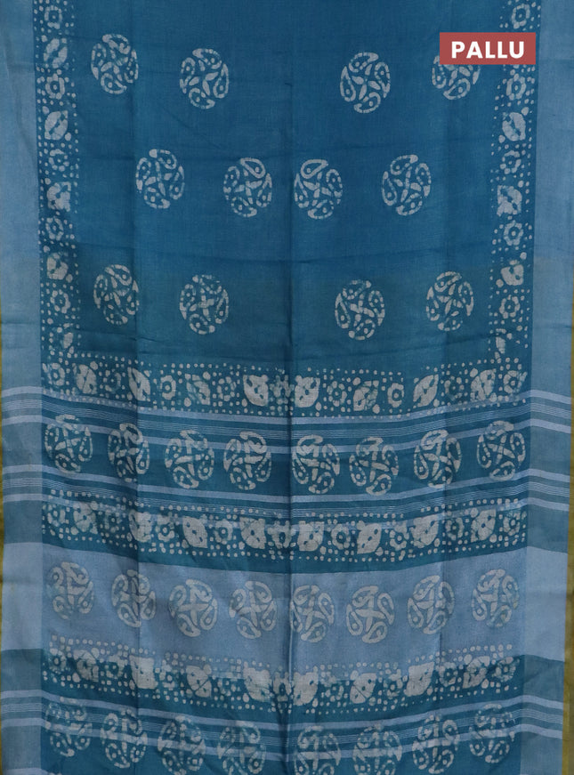Pure linen saree teal blue with batik butta prints and silver zari woven border