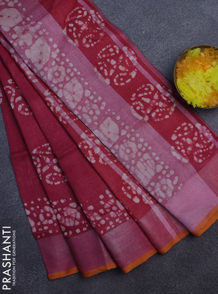 Pure linen saree dark pink and mustard yellow with batik butta prints and silver zari woven border