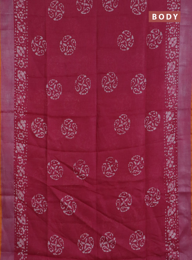 Pure linen saree dark pink and mustard yellow with batik butta prints and silver zari woven border