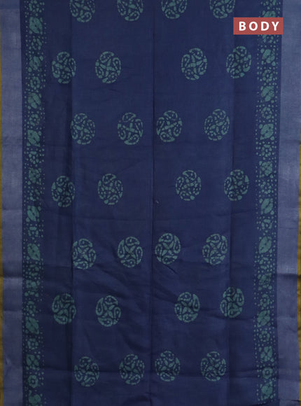 Pure linen saree peacock blue shade and mustard yellow with batik butta prints and silver zari woven border