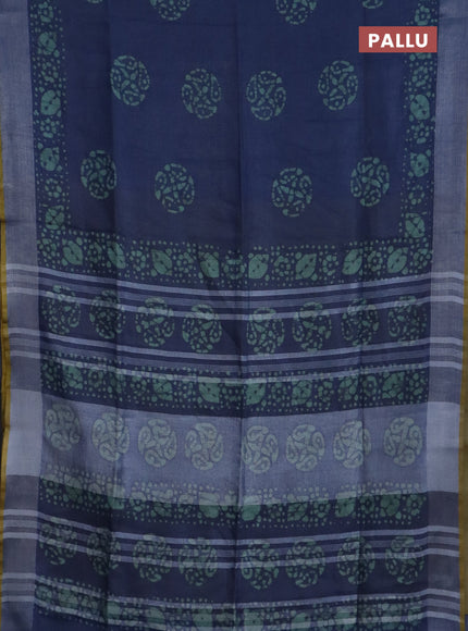 Pure linen saree peacock blue shade and mustard yellow with batik butta prints and silver zari woven border