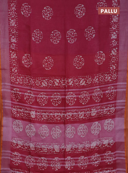 Pure linen saree dark pink and yellow with batik butta prints and silver zari woven border
