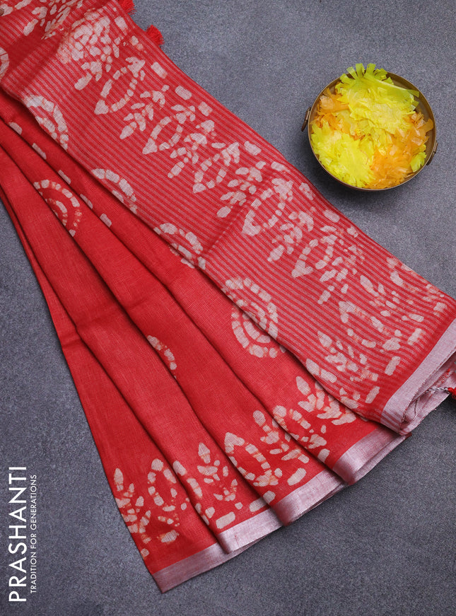Pure linen saree red with batik butta prints and silver zari woven border