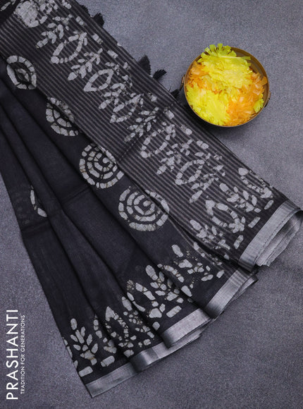 Pure linen saree black with batik butta prints and silver zari woven border