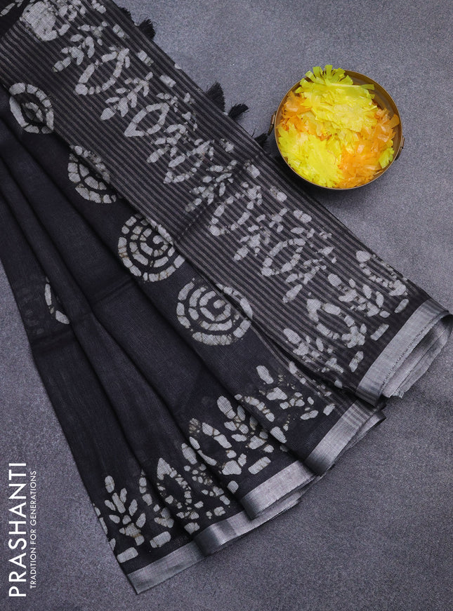 Pure linen saree black with batik butta prints and silver zari woven border