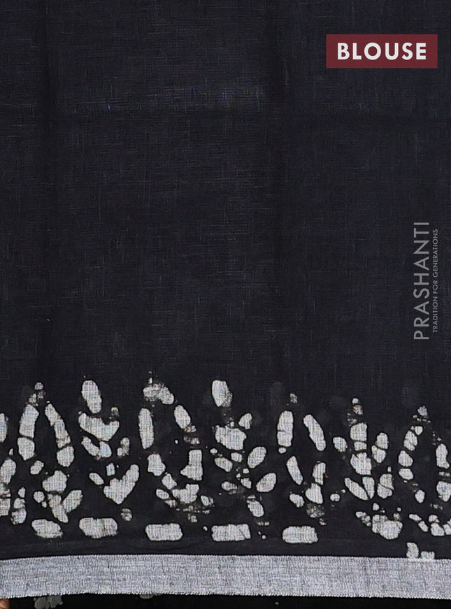 Pure linen saree black with batik butta prints and silver zari woven border