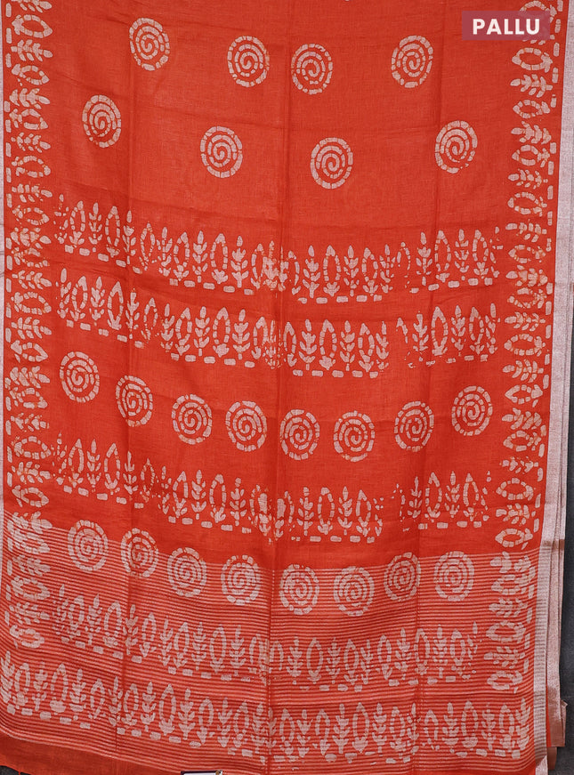 Pure linen saree orange with batik butta prints and silver zari woven border