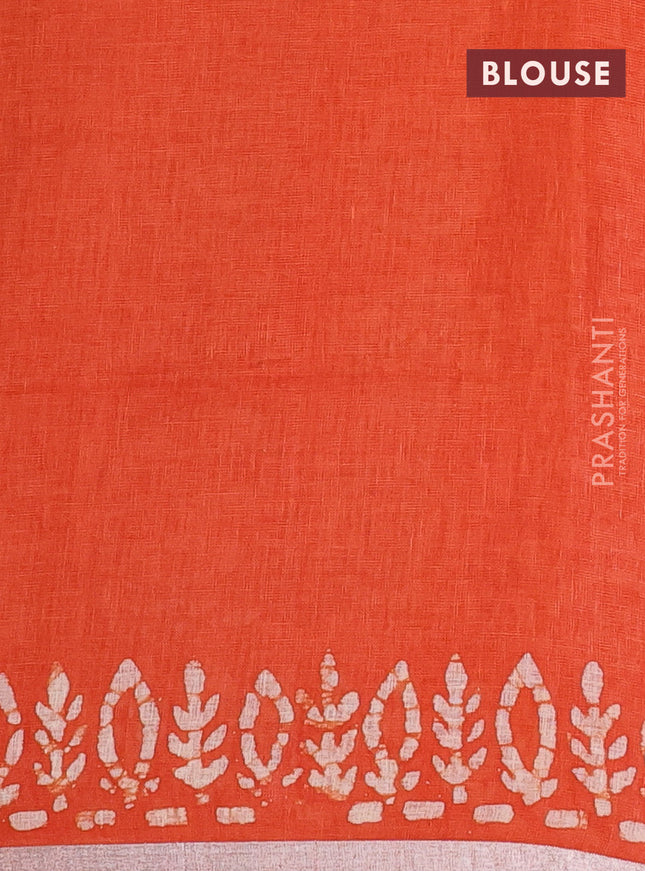 Pure linen saree orange with batik butta prints and silver zari woven border