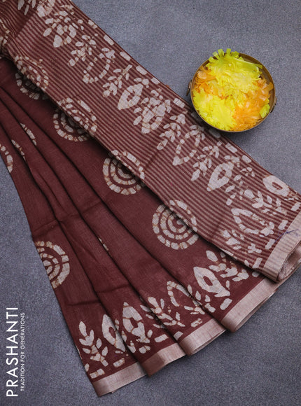 Pure linen saree brown with batik butta prints and silver zari woven border