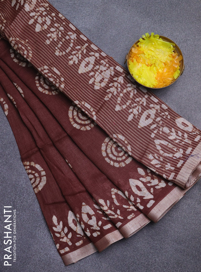 Pure linen saree brown with batik butta prints and silver zari woven border