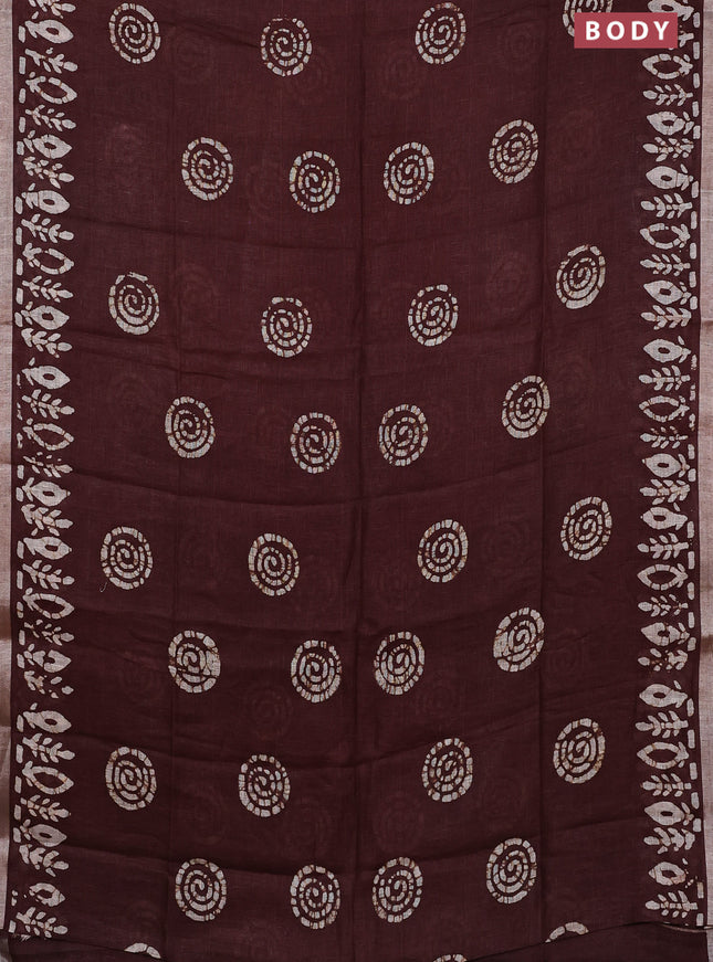 Pure linen saree brown with batik butta prints and silver zari woven border