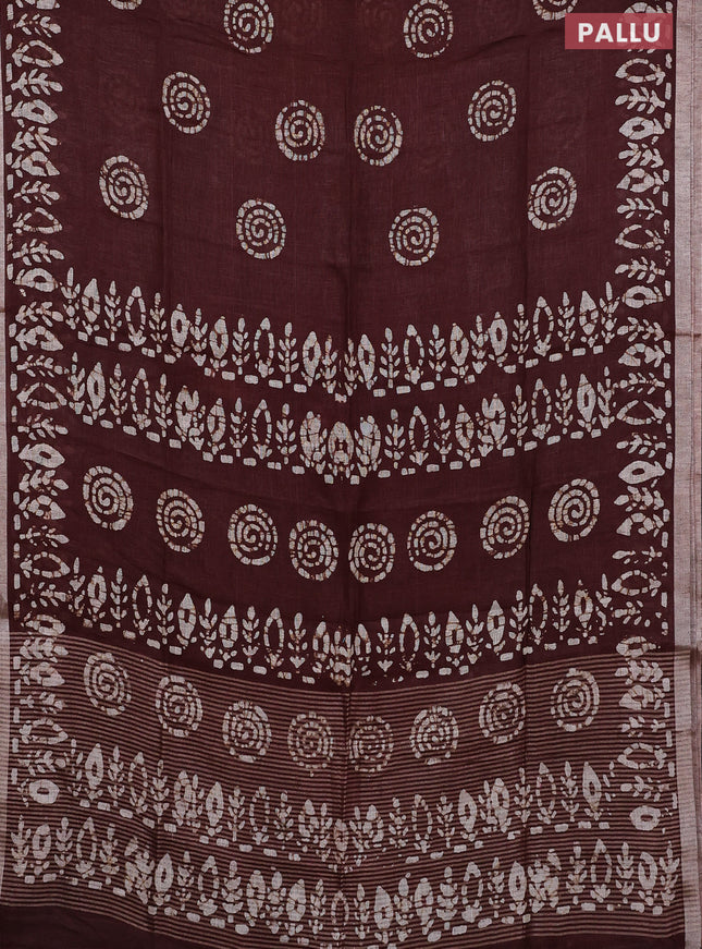 Pure linen saree brown with batik butta prints and silver zari woven border