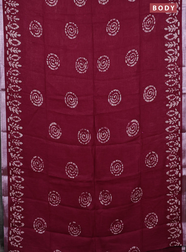 Pure linen saree dark magenta with batik butta prints and silver zari woven border