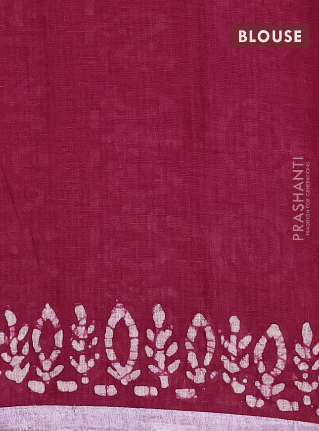 Pure linen saree dark magenta with batik butta prints and silver zari woven border