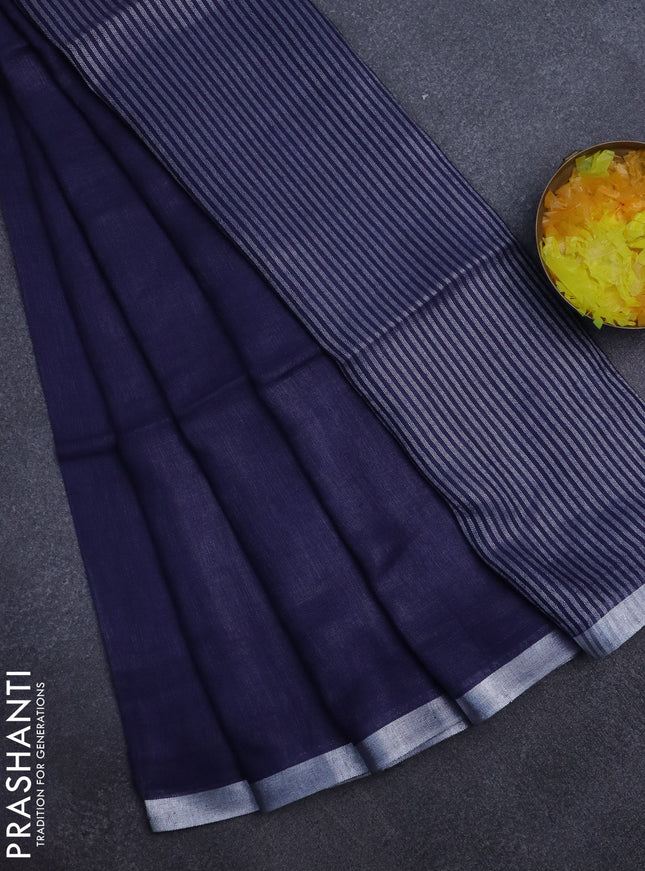 Pure linen saree dark blue with plain body and silver zari woven border