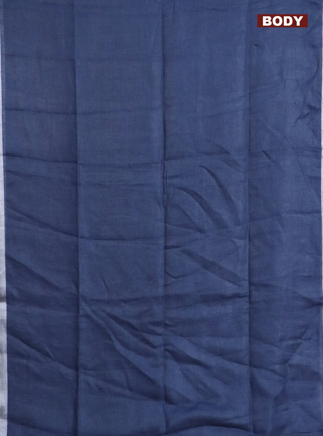 Pure linen saree blue shade with plain body and silver zari woven border