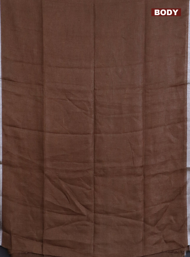 Pure linen saree dark sandal with plain body and silver zari woven border