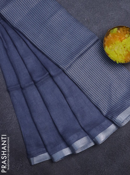 Pure linen saree grey shade with plain body and silver zari woven border