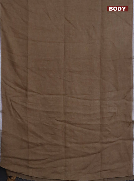 Pure linen saree sandal with plain body and silver zari woven border