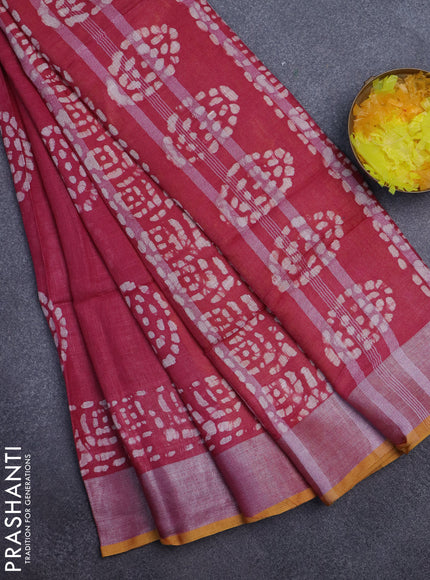 Pure linen saree dark pink with batik prints and silver zari woven border
