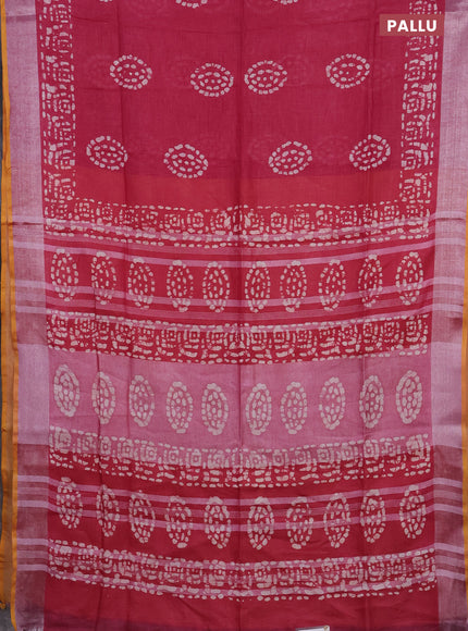 Pure linen saree dark pink with batik prints and silver zari woven border