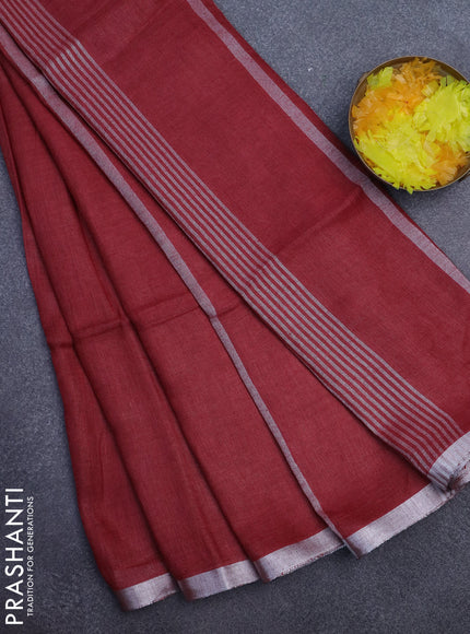 Pure linen saree maroon with plain body and silver zari woven border