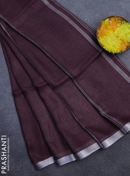 Pure linen saree deep wine shade with plain body and silver zari woven border