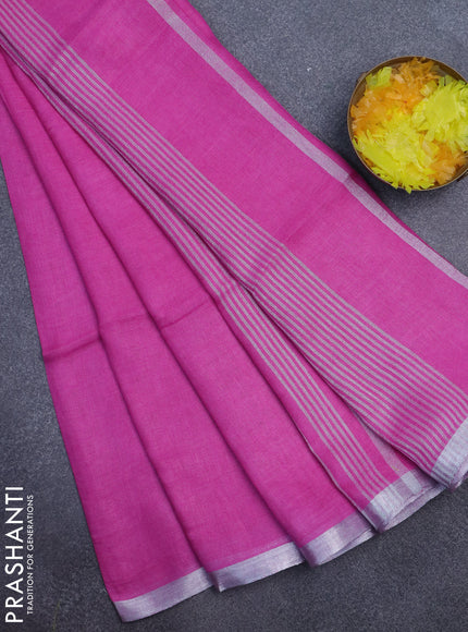 Pure linen saree pink with plain body and silver zari woven border
