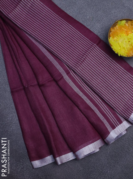 Pure linen saree wine shade with plain body and silver zari woven border