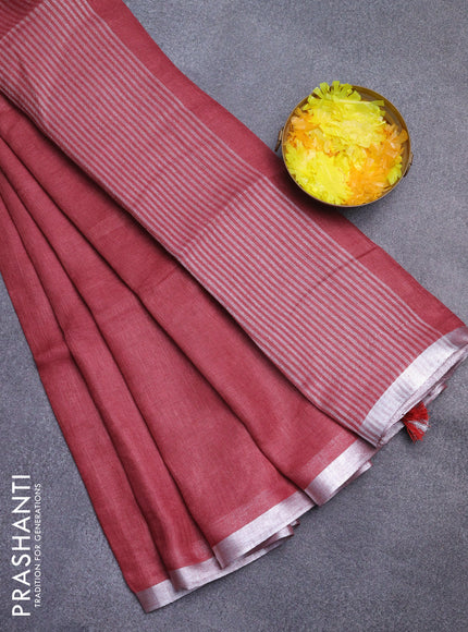 Pure linen saree maroon shade with plain body and silver zari woven border