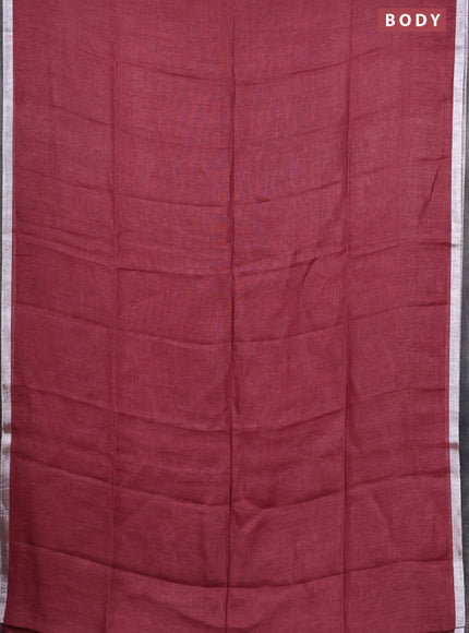 Pure linen saree maroon shade with plain body and silver zari woven border
