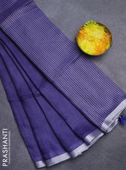 Pure linen saree blue shade with plain body and silver zari woven border