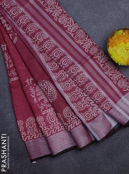 Pure linen saree maroon shade with butta prints and silver zari woven border