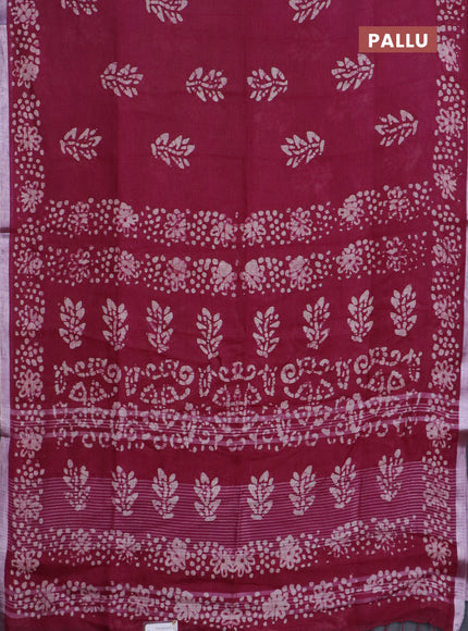 Pure linen saree dark magenta pink with batik butta prints and silver zari woven border