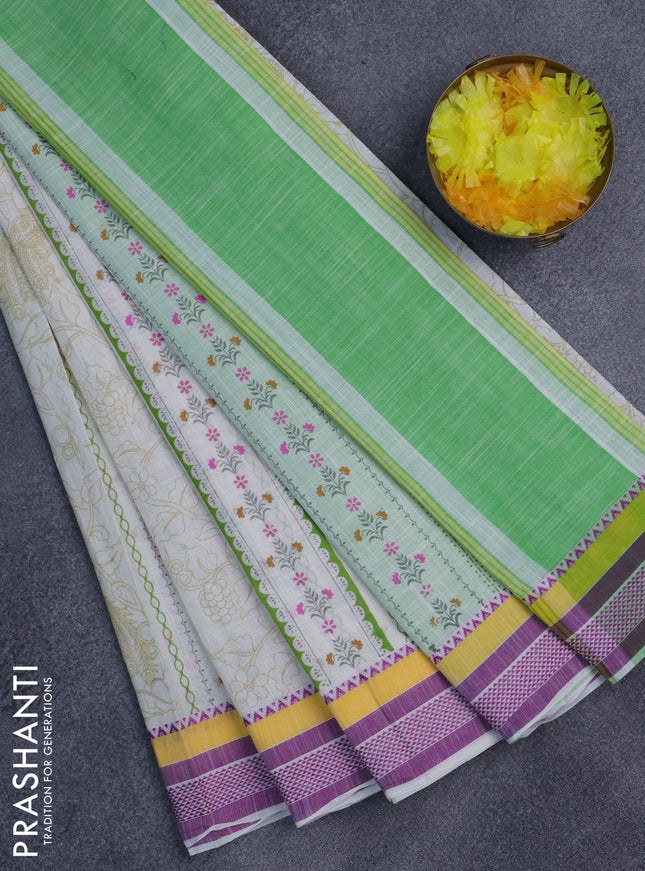 Khadi cotton saree cream and light green with allover prints and woven border