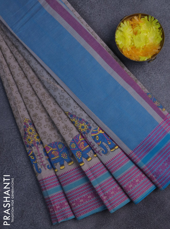 Khadi cotton saree grey shade and teal blue with allover prints and woven border