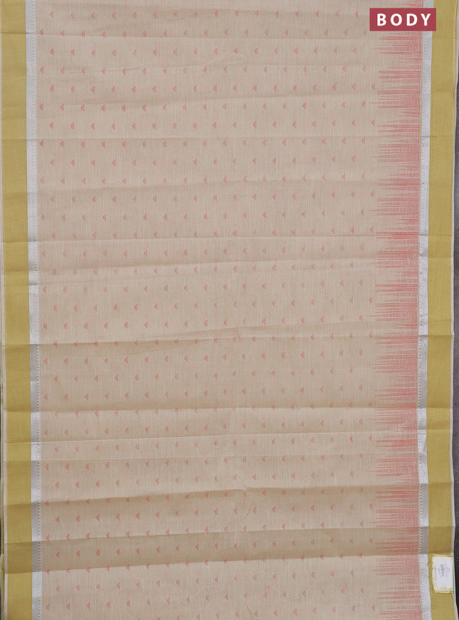 Khadi cotton saree cream and lime yellow with allover buttas prints and silver zari woven simple border