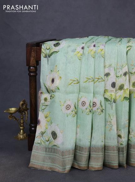 Pure linen silk saree pastel green with allover floral prints and zari woven border