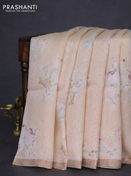 Pure linen silk saree sandal with floral butta prints and small zari woven border