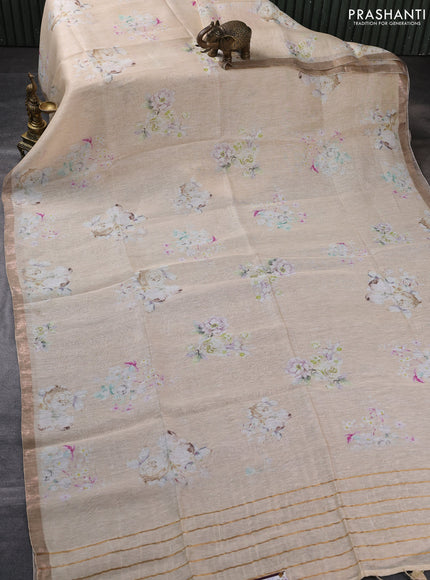 Pure linen silk saree sandal with floral butta prints and small zari woven border