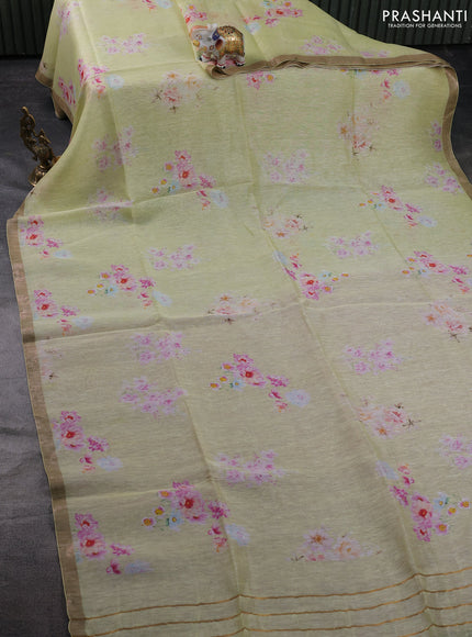 Pure linen silk saree mild pista green and pink shade with floral butta prints and small zari woven border