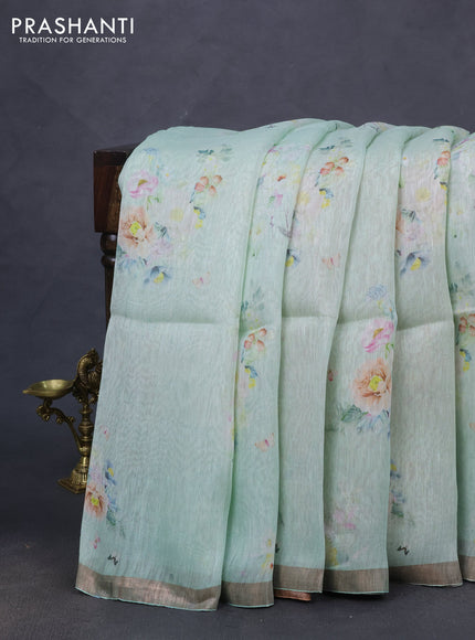 Pure linen silk saree teal shade and sandal with floral butta prints and small zari woven border